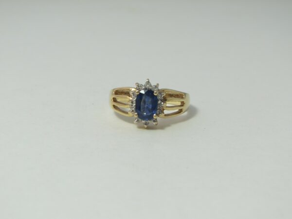 #754  14ct Solid Gold Blue Sapphire & Diamond Ring (Value: $6,140.00)