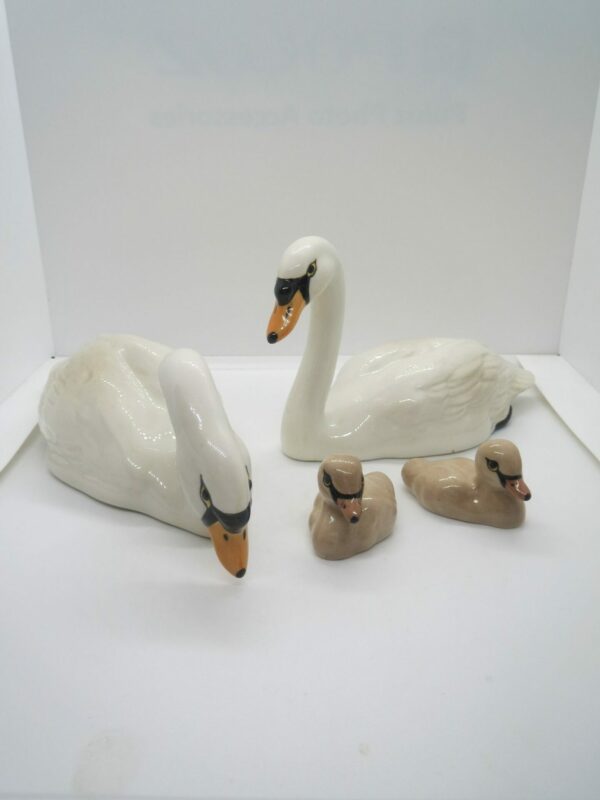 #3034 BESWICK SWANS AND CYGNETS